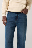 Jean baggy azul oscuro con tiro medio y bota ancha