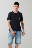 Bermuda en jean slim azul con rotos y desgastes