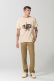 Pantalón slim unicolor en dril tiro medio con bolsillos