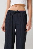 Pantalón azul palazzo con rayas, tiro alto y bota ancha