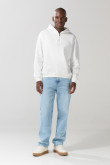 Buzo oversize unicolor con capota y cremallera