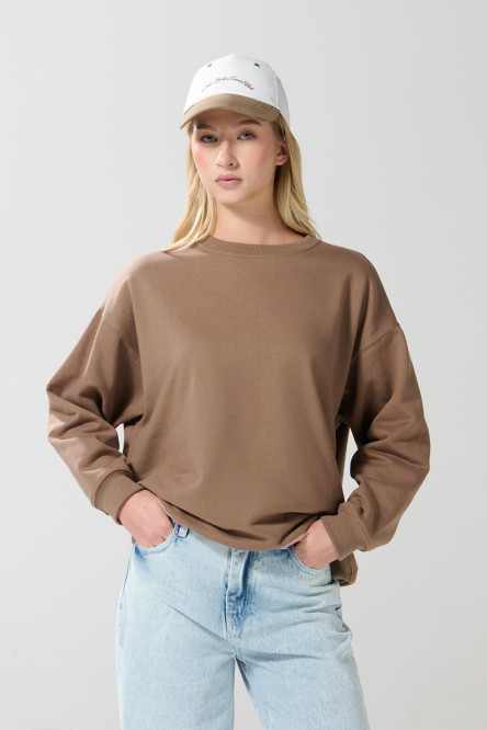 Buzo cuello redondo oversize unicolor con manga ranglan