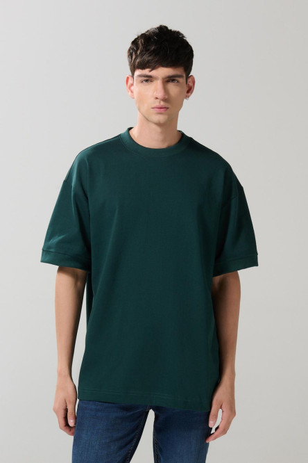 Camiseta oversize manga corta en algodón unicolor