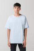 Camiseta oversize unicolor cuello redondo en algodón