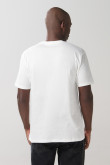 Camiseta cuello redondo crema con arte de Plaza Sésamo