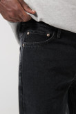 Jean baggy gris oscuro con tiro medio y bota ancha