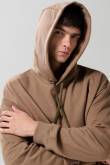 Buzo perchado oversize unicolor con capota y bolsillo