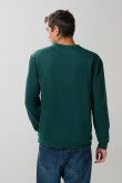 Buzo verde oscuro college con cuello redondo
