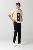 Jean skinny ajustado negro con cremallera y tiro bajo