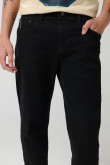 Jean skinny ajustado negro con cremallera y tiro bajo