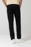 Jean skinny ajustado negro con cremallera y tiro bajo