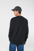 Buzo unicolor oversize cuello redondo con arte college