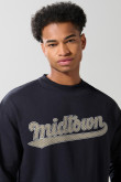 Buzo cuello redondo unicolor oversize con arte college
