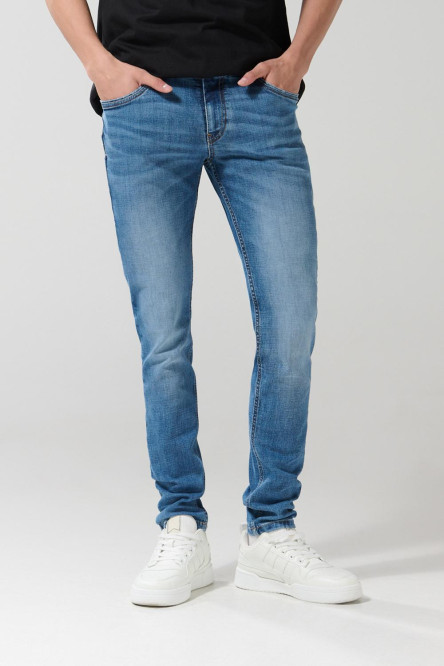 Jean skinny azul oscuro con cremallera y tiro bajo