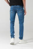 Jean skinny azul oscuro con cremallera y tiro bajo