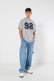 Camiseta unicolor college oversize con manga corta