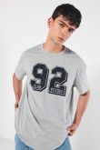 Camiseta unicolor college oversize con manga corta