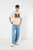 Camiseta unicolor college oversize con manga corta