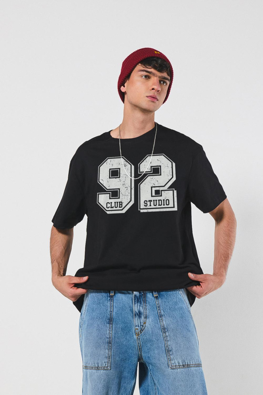 Camiseta unicolor college oversize con manga corta