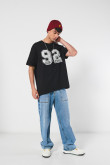 Camiseta unicolor college oversize con manga corta