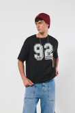Camiseta unicolor college oversize con manga corta