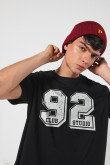 Camiseta unicolor college oversize con manga corta