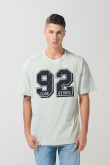 Camiseta unicolor college oversize con manga corta