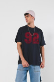 Camiseta unicolor college oversize con manga corta