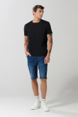 Bermuda en jean tiro bajo slim azul oscura con cremallera