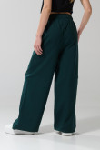 Pantalón jogger unicolor con bolsillos y bota ancha