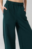 Pantalón jogger unicolor con bolsillos y bota ancha