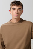 Buzo perchado unicolor cuello redondo oversize