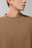 Buzo perchado unicolor cuello redondo oversize