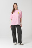 Camiseta oversize rosada tie dye con artes de Los Simpson