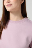 Buzo rosado claro oversize con cuello redondo