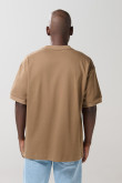 Camiseta oversize manga corta en algodón unicolor