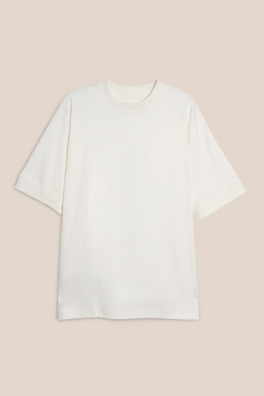 Camiseta oversize manga corta en algodón unicolor