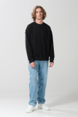 Buzo cuello redondo unicolor oversize con manga larga