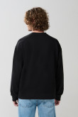 Buzo cuello redondo unicolor oversize con manga larga