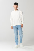 Buzo cuello redondo unicolor oversize con manga larga