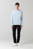 Buzo cuello redondo unicolor oversize con manga larga