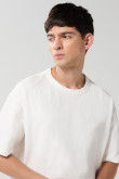 Camiseta oversize unicolor cuello redondo en algodón