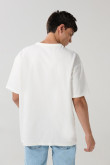 Camiseta oversize unicolor cuello redondo en algodón