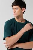 Camiseta oversize unicolor cuello redondo en algodón