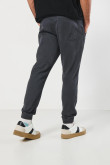 Pantalón jogger unicolor con bolsillos de ribete laterales