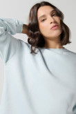 Buzo unicolor oversize con cuello redondo