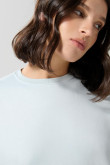 Buzo unicolor oversize con cuello redondo
