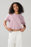 Camiseta unicolor crop top con hombro rodado