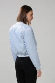 Chaqueta unicolor bomber con acolchado interno y bolsillos