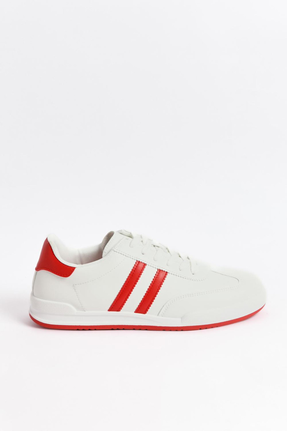 Tenis casuales unicolores con contrastes y cordones